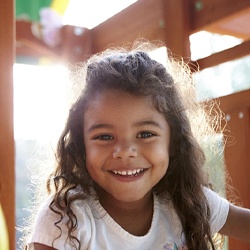 child having fun playing on a playground