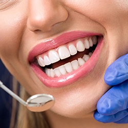 Woman receiving dental exam