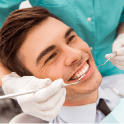 Man receiving dental exam