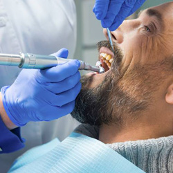 Man receiving dental treatment