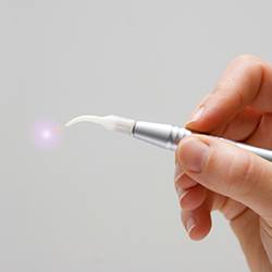 Hand held soft tissue laser wand