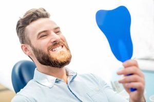 Man at dentist for dental sealants